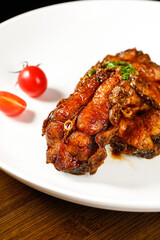 Sweet Sour Smoked Chenpi Pompano Fish Special Chinese Cuisine Dish with Cherry Tomatoes