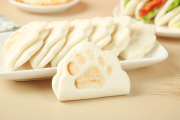 Adorable Animal Paw Print Steamed Buns on White Plates - Cute Breakfast Food