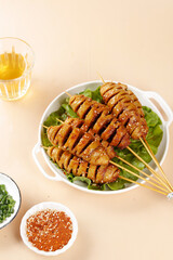 Handmade Gluten Skewers Shaanxi Style Chinese Street Food with Spicy Seasoning and Tea