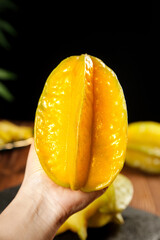 Fresh Yellow Star Fruit Cut in Half Showing Star Shape Cross Section