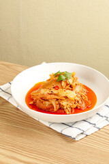 Spicy Red Beef Tripe with Chili Oil - Traditional Asian Cuisine in White Bowl