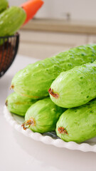 Fresh Green Prickly Cucumbers from Shandong China on Kitchen Counter