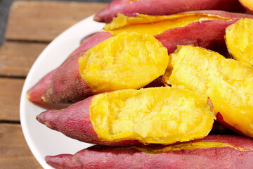 Fresh Yellow Hearted Sweet Potatoes Sliced on White Plate - Tianmu Mountain Organic Vegetables