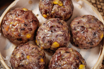 Traditional Chinese Eight Treasures Multi-Grain Buns with Beans and Corn in Steamer Basket
