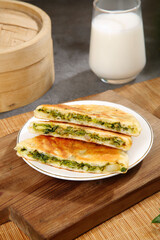 Handmade Chinese Scallion Pancakes with Green Onion Filling and Milk Glass Traditional Asian Breakfast