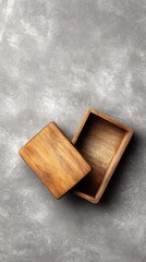 Empty wooden box on gray surface