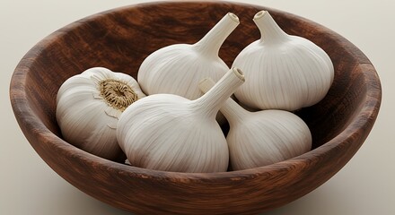 Fresh garlic bulbs in wooden bowl on neutral background