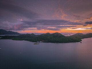 Aerial view of a beautiful tropical island with crystal clear water, limestone cliffs, Philippines