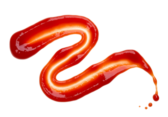 Thick red ketchup forms a zigzag line shape dripping onto a clean white surface food condiment.