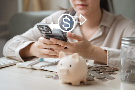 refund, complete, payment, finance, ecommerce, success, transaction, Woman using smartphone with money transfer icon represents refund completion, approved payment, and ecommerce transaction success.