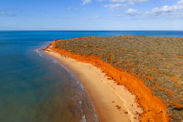 Aerial view of colourful red dunes and beach at Cape Peron of Shark Bay in Western Australia