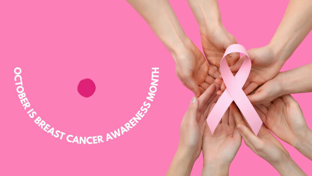 Hands come together to show support for breast cancer awareness