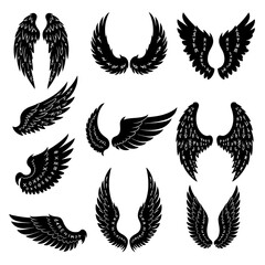 Obraz premium Black Wing Silhouettes with Runes, Vector Illustration Set