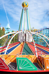Vintage colorful rainbow amusement park ride on a sunny day at Dutch Wonderland