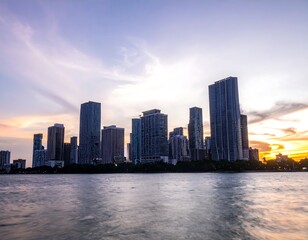 Fototapeta premium City skyline at sunset over water (2)