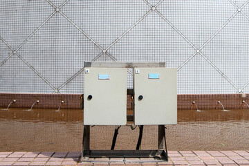 Structure steel equipment distribution electric small. Power button to distribute electricity supply. Temporary electrical control two box outdoor for small business, Main substation. Circuit Breaker.