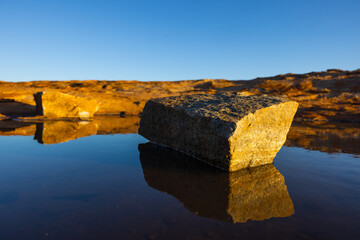 Reflections in a pond in the outback of the Murchison Region of Western Australia