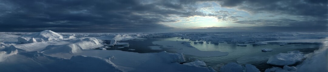 Panoramic hdr view of icy landscape at dawn over arctic ocean
