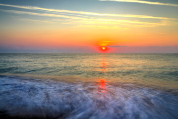 Beautiful summer sunrise over the beach