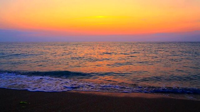 Beautiful summer sunrise over the beach