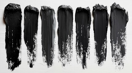 Bold Black Paint Strokes on White: Abstract Texture, Artistic Contrast, Modern Design.
