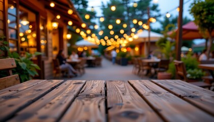 A serene evening scene in an outdoor patio of a restaurant, featuring string lights, wooden picnic tables with benches, a dark sky, and a tranquil ambiance.