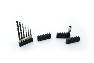 Drill and Bit Set in Plastic Holder on White Background
