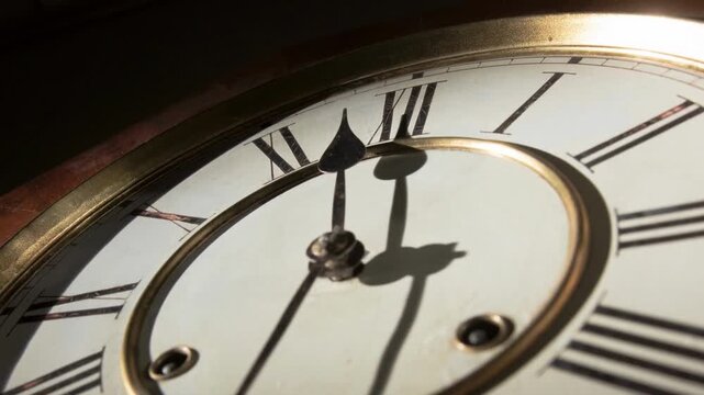 Old fashioned clock zoom vintage watch roman numerals spinning in dark black background timelapse