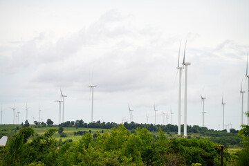 Wind energy. Wind power. Sustainable, renewable energy. Wind turbines generate electricity. Wind farm. Sustainable resources. Sustainable development. Green technology for energy sustainability.