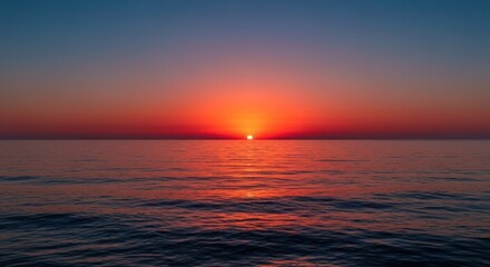 Fototapeta premium Blurry sunset over calm ocean
