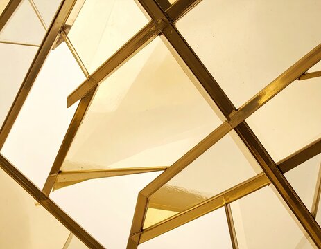 Abstract golden geometric frame with glass
