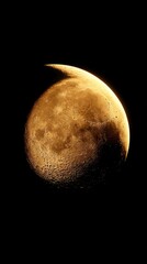 Crescent moon in golden light