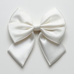 Elegant white satin bow with layered loops and tails on a smooth