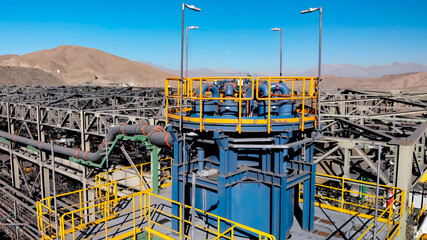 Mineral processing plant with crushers, conveyor belts and mineral thickeners