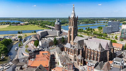Aerial drone view of Roermond town cityscape, church and river Meuse top view from above,...