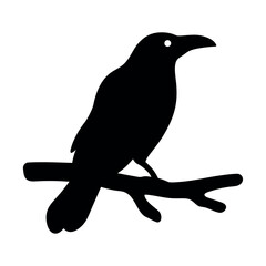 Silhouette of a black crow perched on a bare tree branch against a white background