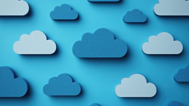 Blue and light blue paper cut clouds creating a pattern on a vibrant blue background, illustrating cloud computing