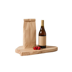 Still life composition featuring wine bottle, strawberries, paper bag, and wooden board