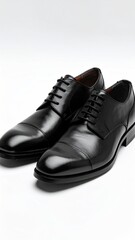 Elegant Black Leather Oxford Shoes on White Background Stylish Formal Footwear Close Up Clean Lighting Classic Style Fashionable Laces for Business Occasions