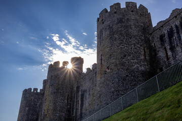 Sunburst over towers of Conwy Castle