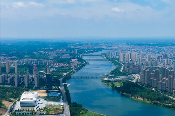 Suizhou City Hubei Province China river city landscape panorama showing buildings and bridges.