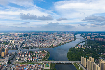 Suizhou City Hubei Province China shows a wide river flowing through its urban expanse, with...