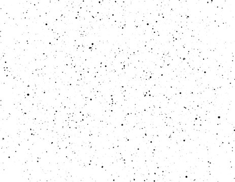 Abstract textured background of small black dots and squares on a white field