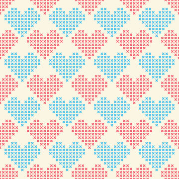 Seamless cross-stitch heart pattern creating textile background