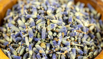 Dried lavender flowers in a wooden bowl