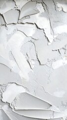 Obraz premium Abstract textured surface with cracked, peeling paint in shades of gray and white