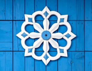 White floral design on blue wood