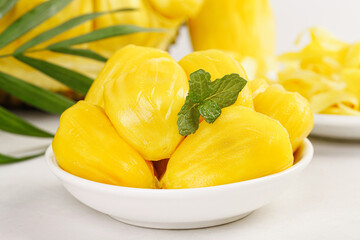 Fresh Yellow Jackfruit Segments in Bowl with Mint Garnish - Tropical Asian Fruit Dessert
