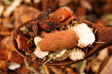 Sichuan Hot Pot Spice Collection with Star Anise and Cinnamon on Wooden Spoon