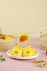 Cute Yellow Custard Buns with Cartoon Faces - Sweet Asian Bakery Treats for Kids